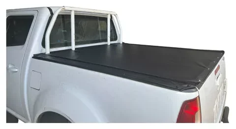 Capota marítima con reja original para Tata Xenon 2013 en adelante, ideal para proteger la carga de tu camioneta en Chile.
