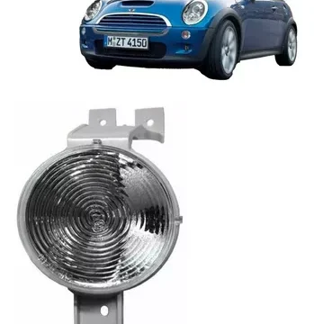 Faro delantero de un Mini Cooper modelo 2001 a 2004 en el extremo derecho de la imagen