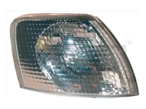 Faro delantero oscuro de un Volkswagen Passat B5 fabricado entre 1997 y 2000.